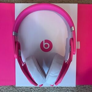 Hot pink Beats Mixr over-ear headphones